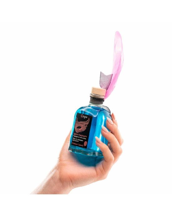 Набір для масажу Orgie – Sexy Therapy Cotton Candy (100 мл), їстівна розігрівальна олія + пір’їнка Набір для масажу Orgie – Sexy Therapy Cotton Candy (100 мл), їстівна розігрівальна олія + пір’їнка