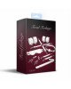 Набір Feral Feelings BDSM Kit 7 White, наручники, поножі, конектор, маска, падл, кляп, затискачі Набір Feral Feelings BDSM Kit 7 White, наручники, поножі, конектор, маска, падл, кляп, затискачі